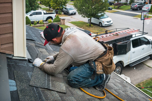 Professional Roofing technician working in Kents Store, VA